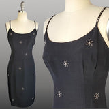 1950s Cocktail Dress / Late 1950s Black Faille Cocktail Dress With Studded Pinwheels / 1950s Black Cocktail Dress / Size Medium
